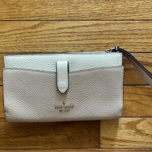 Kate Spade large wristlet - front can hold phone.
